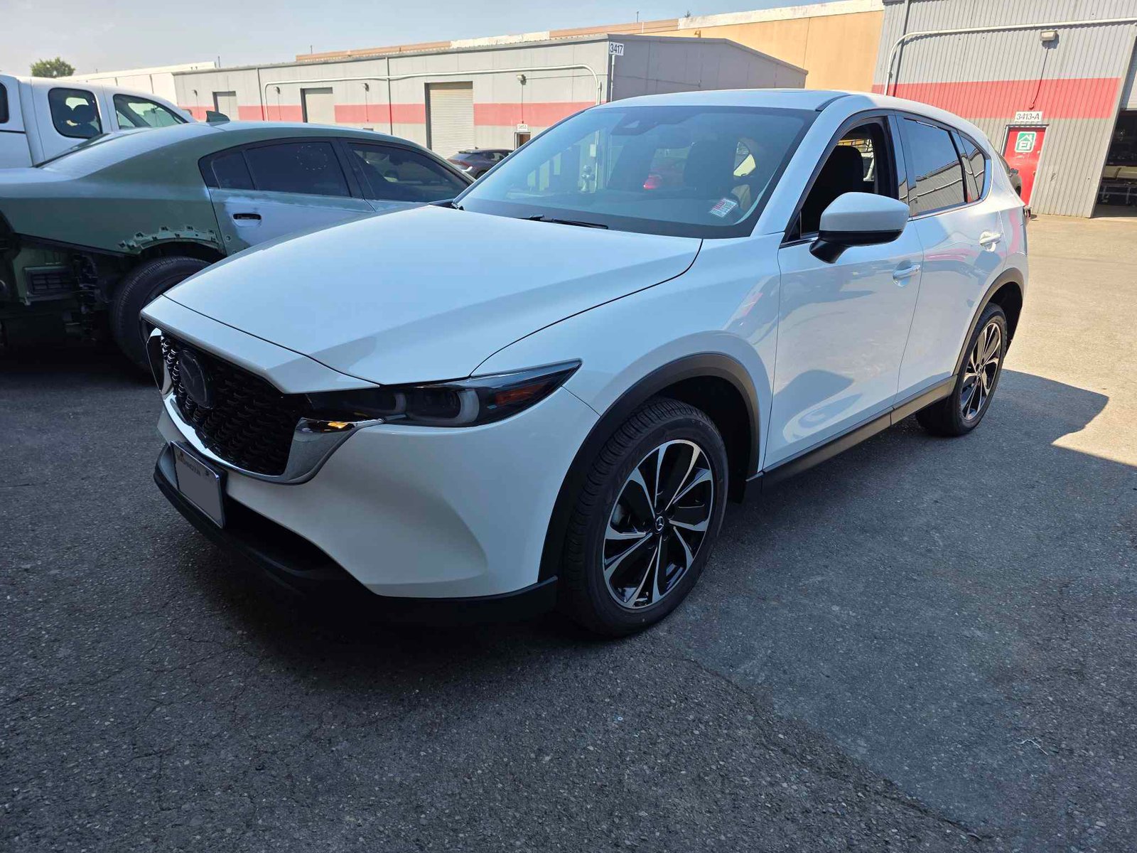 A white Mazda CX-5 has been fully repaired. gallery image 10